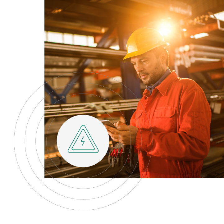 A male worker with a yellow cap and a visual representation of risk management alert popup on his smart phone