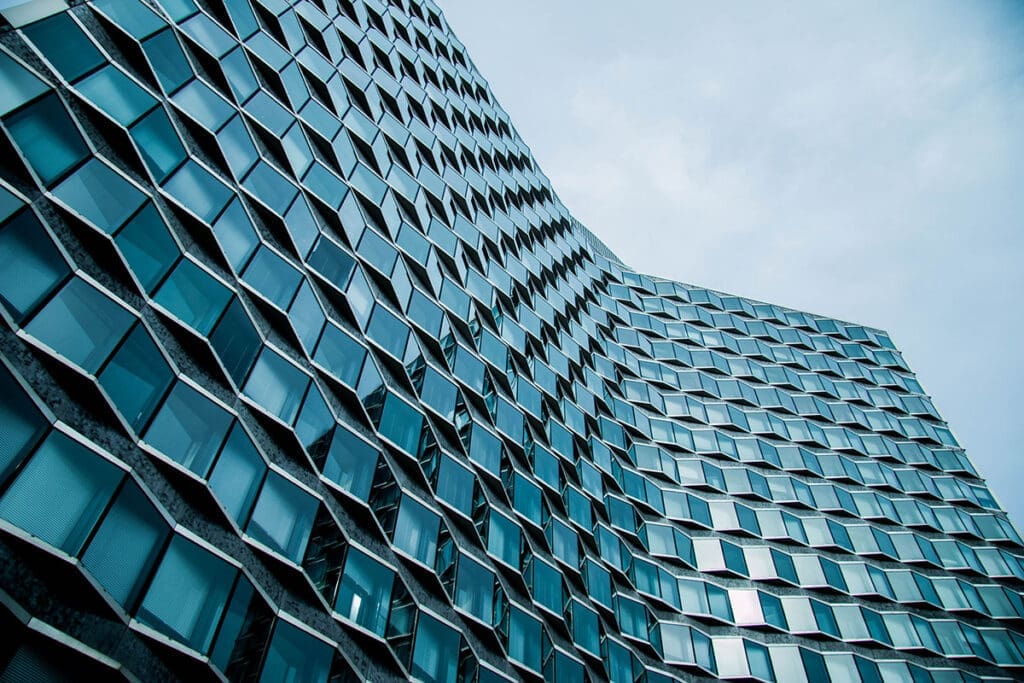 Abstract view of an office building with many convex windows from below