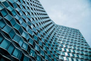 Abstract view of an office building with many convex windows from below