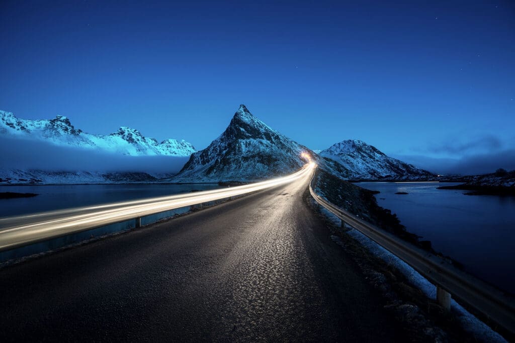 Long exposure of a winter mountain road