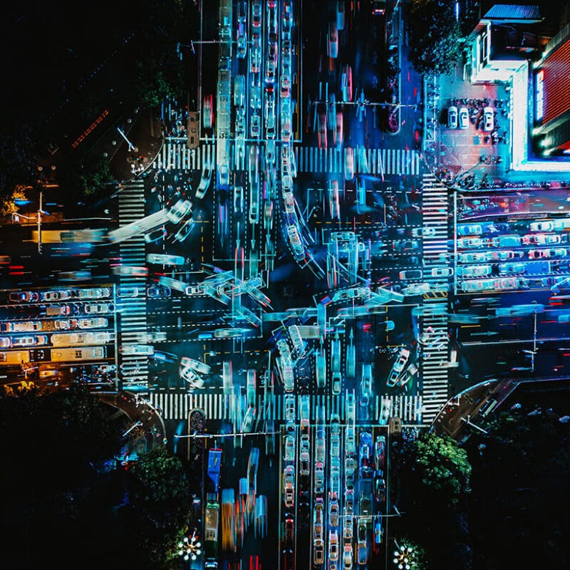 Drone Point View of Crossroad and City Traffic at Night